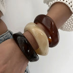 The Obsidian & Amber — Sculptural Cuff