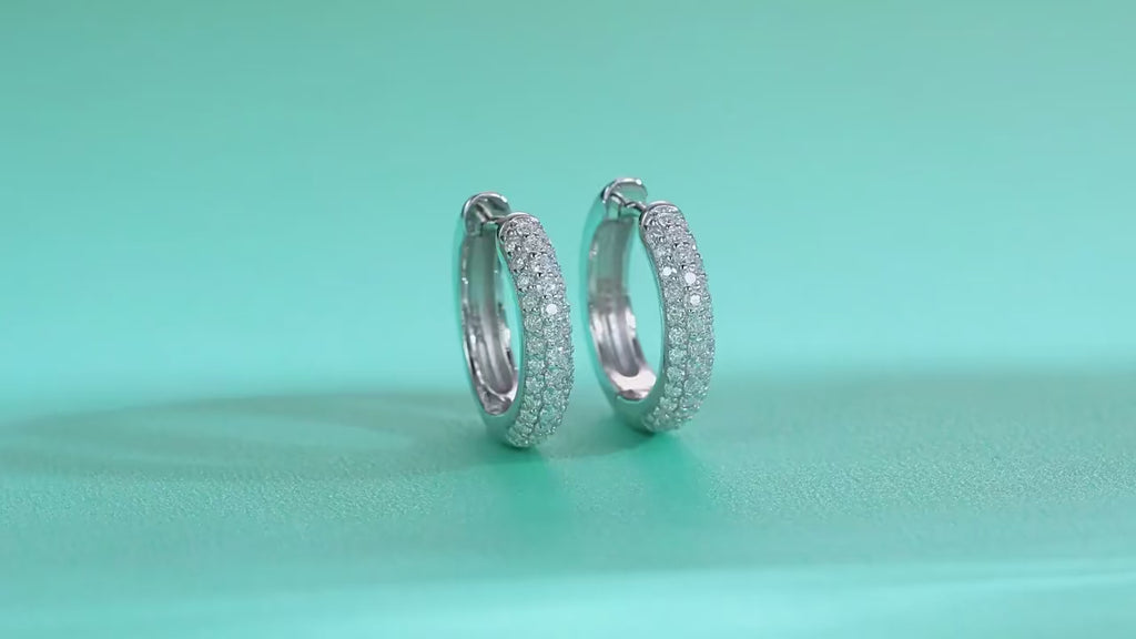 Radiant Hoops by ZÜRVRA, showcasing the precision-cut crystal brilliance and the secure integrated clasp in a seamless 360-degree motion.