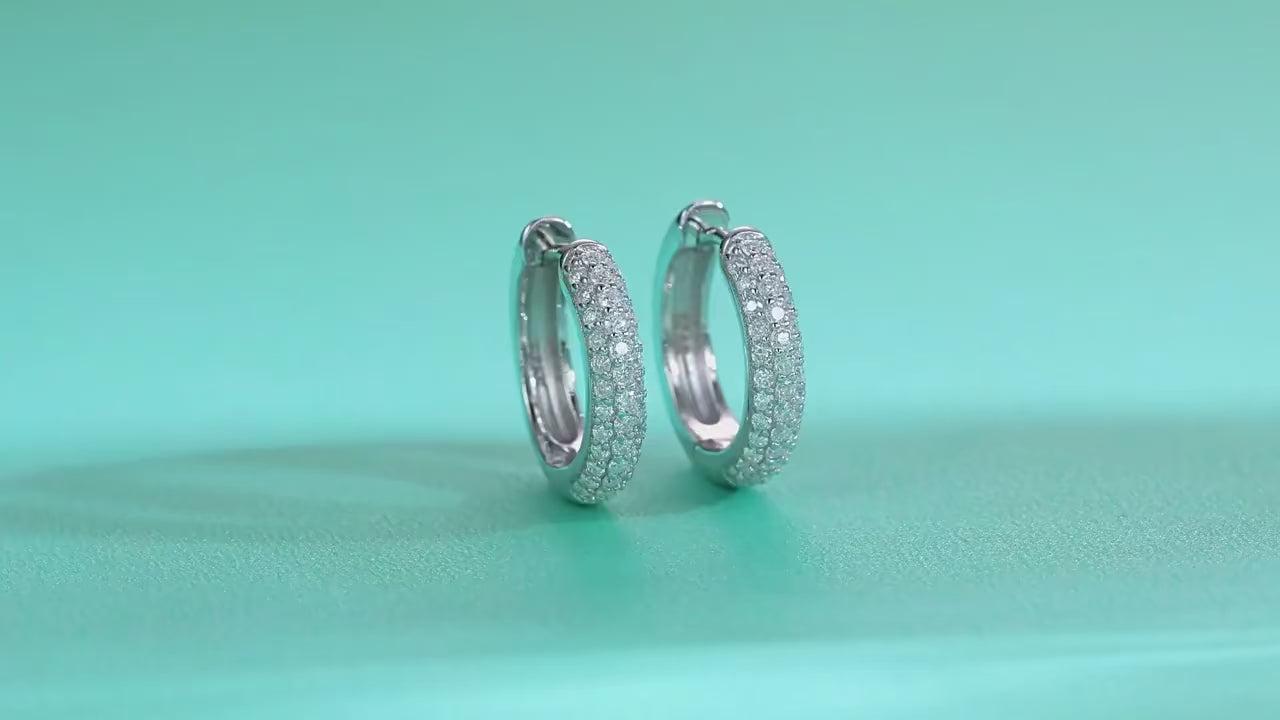 Radiant Hoops by ZÜRVRA, showcasing the precision-cut crystal brilliance and the secure integrated clasp in a seamless 360-degree motion.
